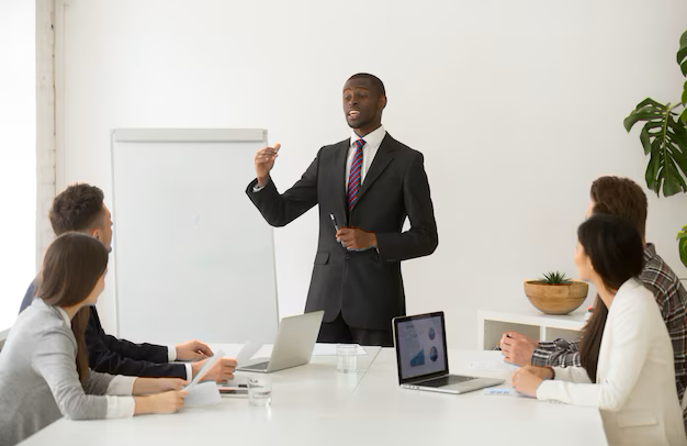 confident-african-speaker-business-coach-giving-presentation-team_1163-4620